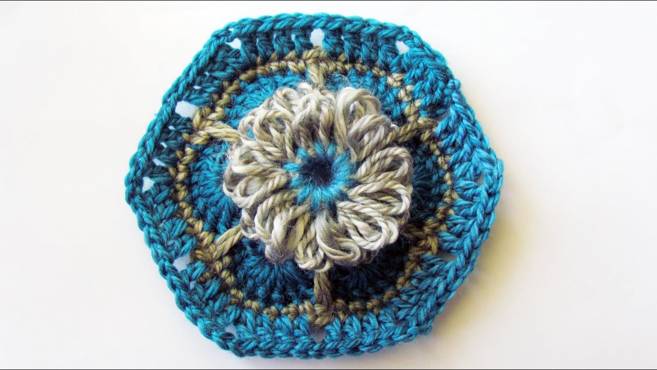African Flower Motif with a Loomed Flower Centre