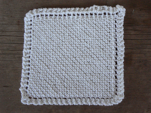Dishcloth with a border of holes