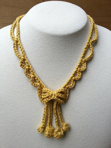 Looking Glass Necklace With Bow Center